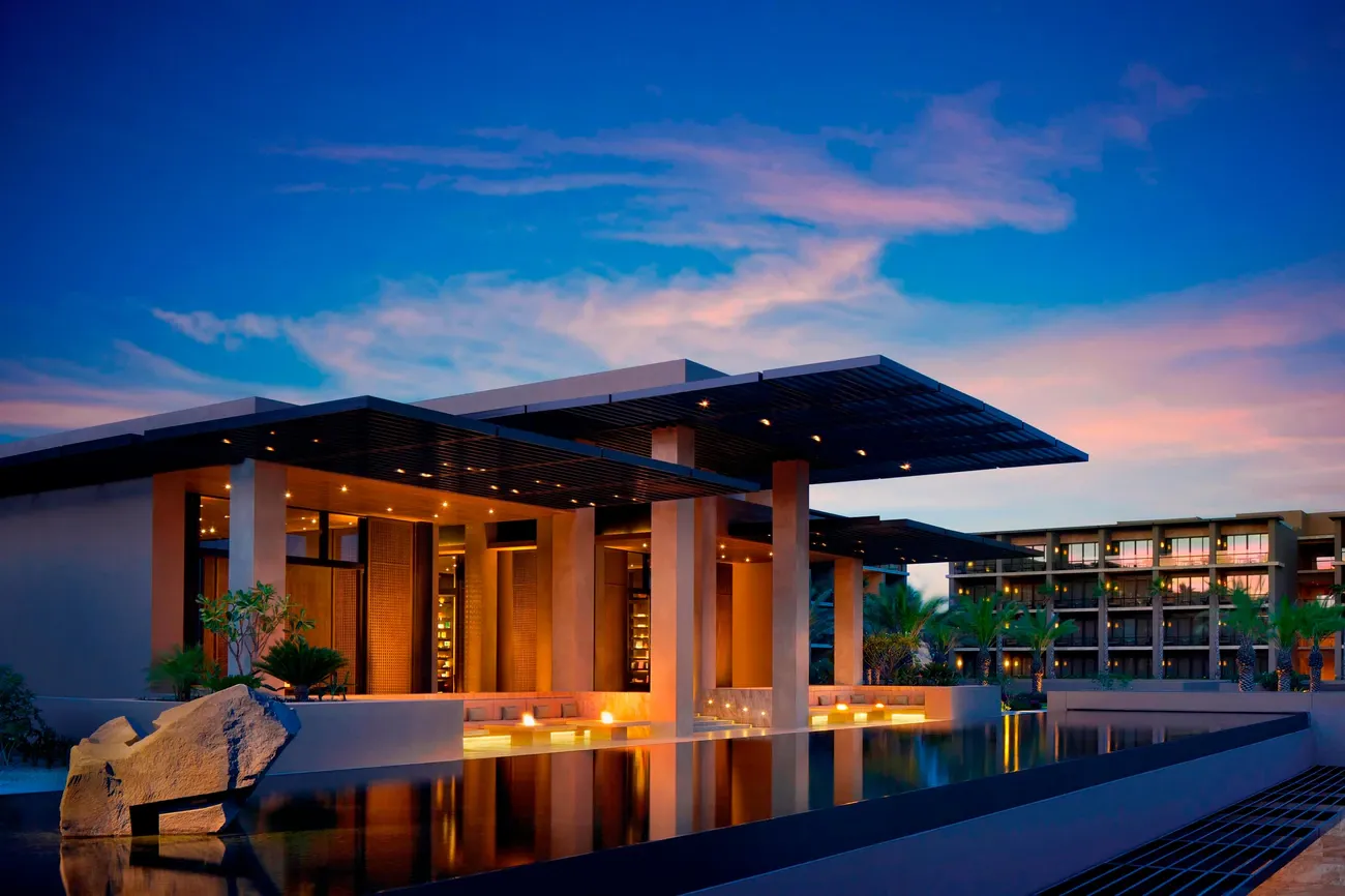 Puerto Los Cabos marina homes with yachts, waterfront residences, and desert mountain views